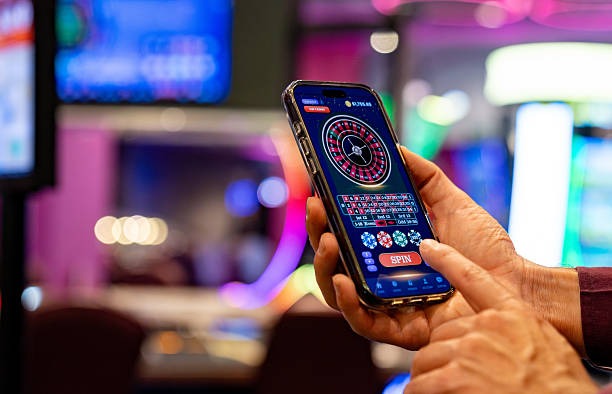 Live dealer at Pretty Gaming studio operating blackjack table with multi-camera feed